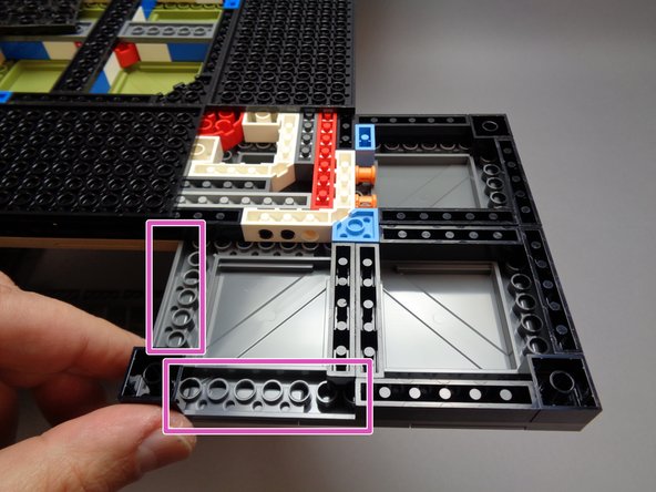 When replacing the 1x6 brick, be careful not to press too hard and cause the top side of the tower frame to come loose.  It is a good idea to support the top side of the foot with one hand while pressing down on the 1x6 brick with your other hand.