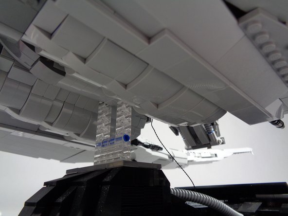 As shown in the first photo for this step, you should have the power wire coming out the bottom of the head.