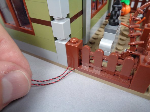Make sure the wires run to either side of the baseplate stud, not on top of the stud.