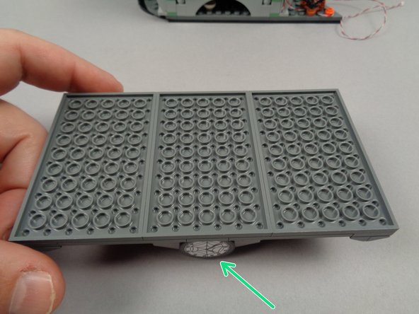 Next you will mount the spotlight that shines down onto Jack's podium inside the town hall.