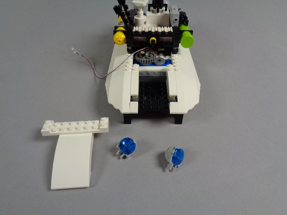 When you are finished doing this, your Ecto-1 roof should look like the roof in the third photo for this step.