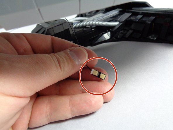 As shown in the third photo, take the small adapter from Bag 1 (labeled BRANCH13 on the back) and connect the power wire plug to one end of the adapter.  It does not matter which end.