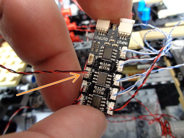 As shown in the photo for this step, connect the control panel light to the #8 plug on the BRANCH09X adapter board.