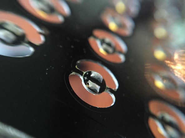 The solder should be in a lump over each pad-- this is critical for later steps, when you will solder wires to each pad (you will need to fully cover each wire lead with solder to hold it firmly in place).