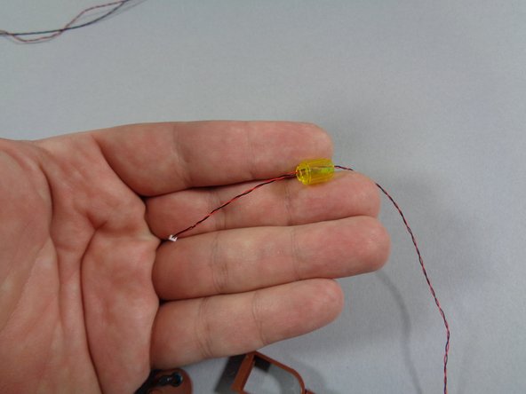 As shown in the first photo, take each LED light and carefully bend the light so it faces forward as shown.