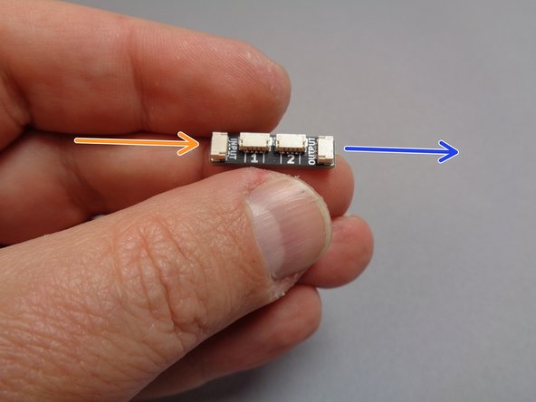The first photo for this step shows a close-up of one of the adapter boards.  In order for your light kit to work properly, it is essential that you connect cables to the board in the exact order shown in the following steps.