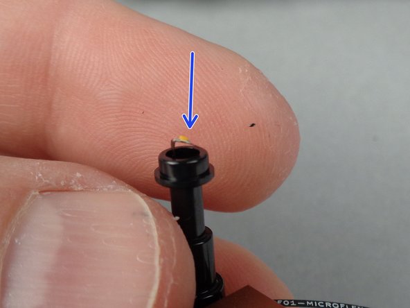 As shown by the red line in the first photo, carefully bend the LED light below the area of its light chip so the light faces upward.