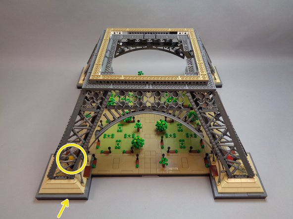 Begin your installation by removing the top sections of your Eiffel Tower and placing the base section on a firm, flat surface with plenty of space around the tower to allow it to be rotated during installation.