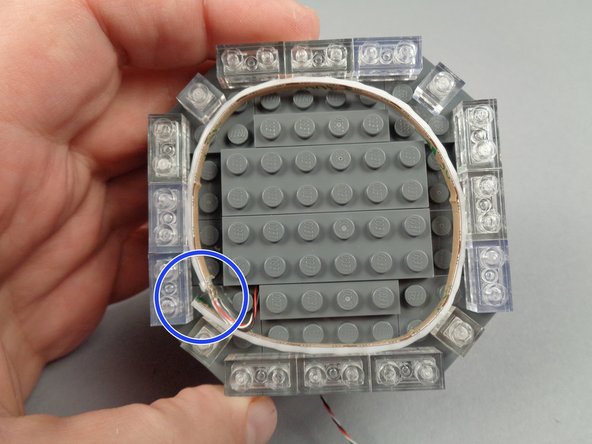 Make a complete circle running once around the tower as shown in the second photo.