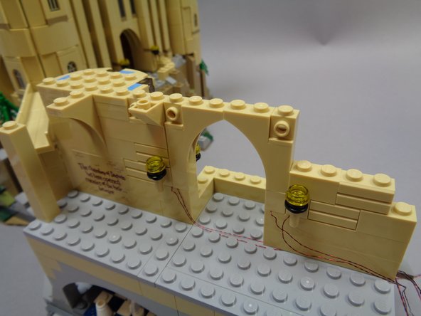 After you have verified that all lights are operational, you can begin re-assembling the castle sections as shown.