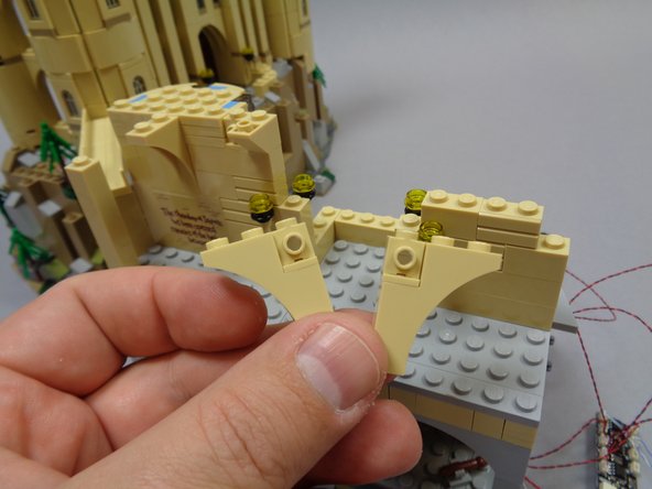 As shown in the third photo, remove the two center arches.