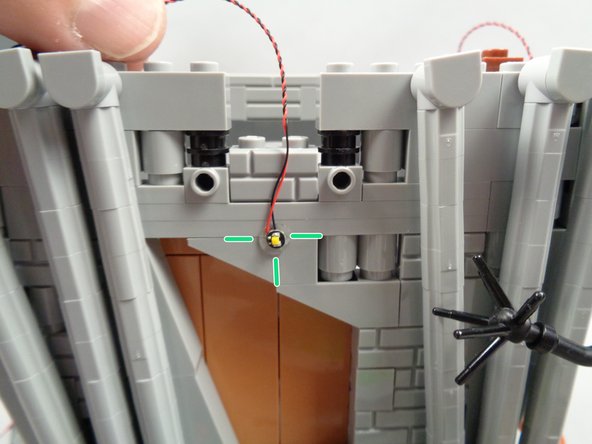 Align the LED light as shown, in line vertically with the slope below and in line horizontally with the top of the slope behind.