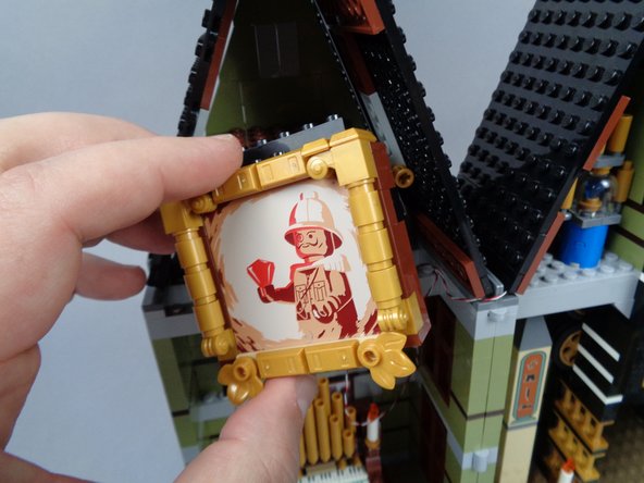 Remove the painting assembly, as shown in the first photo for this step.