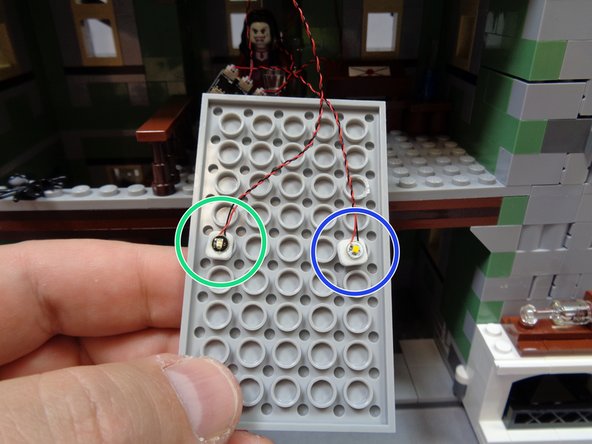 As shown in the second photo, mount the green Pico LED light on the opposite side of the attic floor from the warm white light.