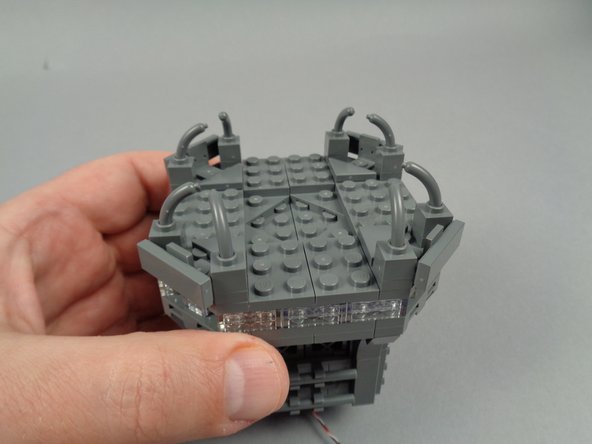 Make sure the corner section pieces do not pinch any wires or crush the flexible LED light strip beneath.