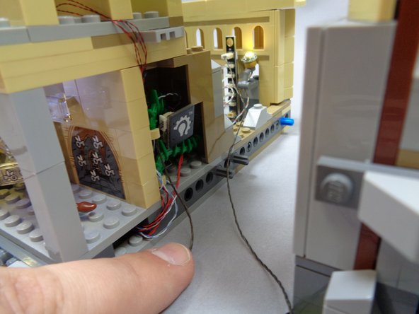 The third photo shows both sections of the castle connected with a minimum of wires showing.