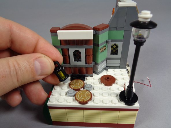 As shown in the second photo, remove the lantern.