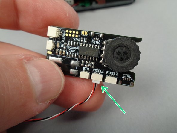 As shown in the first photo for this step, remove the main lighting effect controller and 3-wire connecting cable (with red/white/black wires) from the small pink bag that was included inside Bag 1 of your light kit.