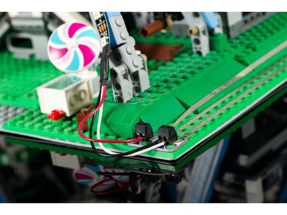 We added a second strip of NeoPixels so we could light up both sides of our Ferris Wheel.