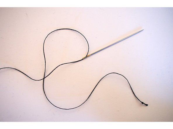 Double or triple knot the end of the thread