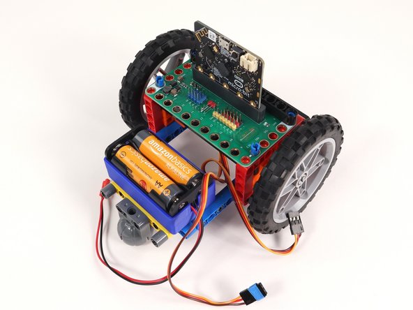 On the back of the Rover disconnect the battery pack and both servos from the Bit Board.