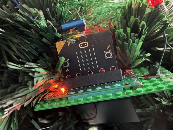 Place the lights on the tree, and reassemble the circuit.