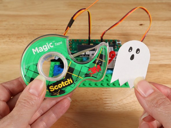 Cut out the ghost from the template or make your own.