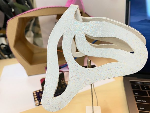 We painted the wings white, then covered them with a coat of glitter Mod Podge to add some sparkle.