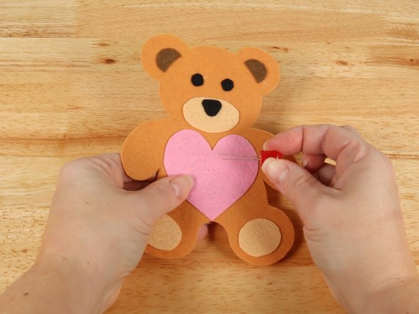 Add the LED by pushing the legs through the holes.