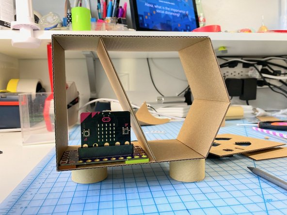 We placed the micro:bit and Bit Board inside the box to make sure we placed the divider in a position that would allow it to fit.