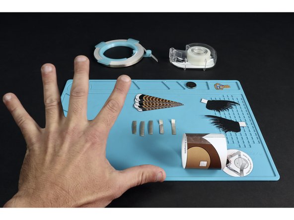 Use the diagram to help you measure and cut 5 total pieces of conductive Maker Tape.