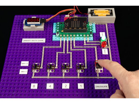 You could add another switch (so you have a 5 bit register) and then adjust the code so it goes from 0 to 31. A bit more challenging for sure!