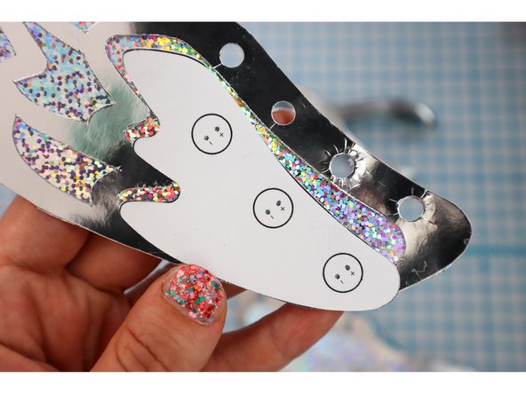 Use the template and a pushpin to poke holes for the LED legs.