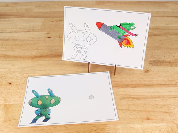 Poke holes through the front of the card for the LED legs, then push the legs through the front.