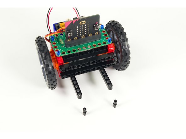 Turn the Rover back over so it can rest of the wheels.