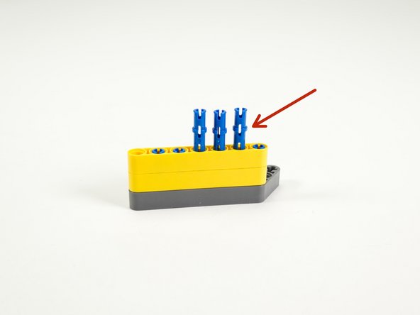 Add three more long pins.