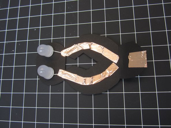 Run two pieces of tape along the top of your project.