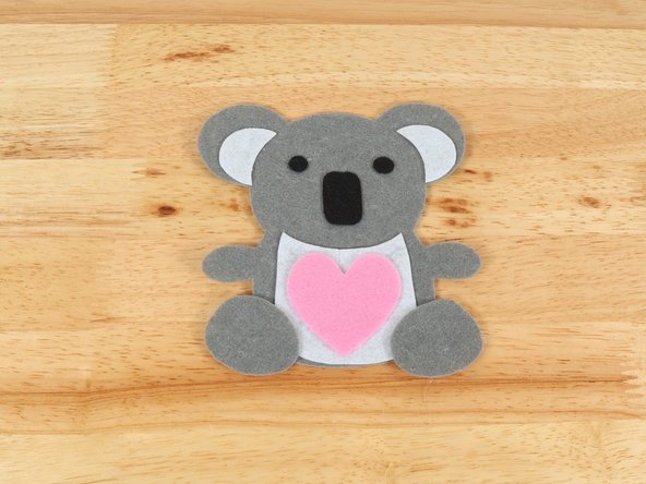 Regular Elmers glue and Tacky glue both work well, but you will need to give the Koala Bear time to dry overnight before adding the circuit. Hot glue also works well and dries fast so you can build the circuit right away.