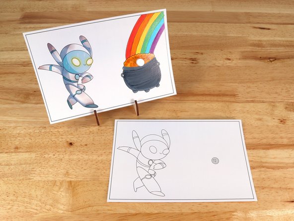 Poke holes through the front of the card for the LED legs, then push the legs through the front.