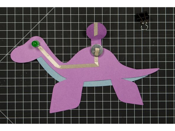 If you wanted to, you could use two tape loops (one for each side of the battery) and turn on and off your circuit without the need of a binder clip.