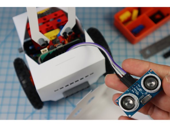 Use a beam to secure the front in place as shown.