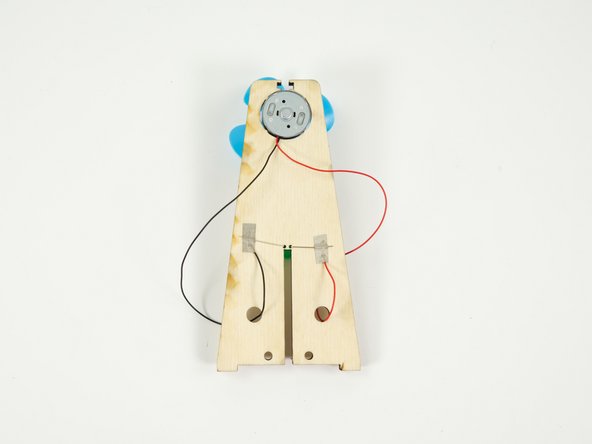 We'll now connect the motor wires to the LED legs.