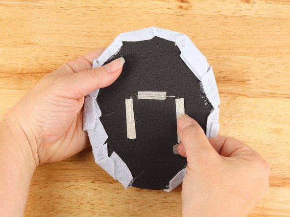 Place another piece of Maker Tape OVER THE TOP of the LED legs so the LED legs have Maker Tape under and on top of them.