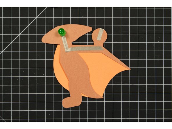 You can choose to make a right angle turn or overlap multiple pieces of tape. Either method will work with Make Tape because it's conductive on all sides.