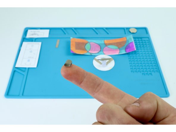 Use one of your two remaining Maker Tape sections to make a tape loop as shown.