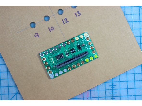 Glue LEGO in place, making sure that the holes for pins 9, 10, 12, 13, and GND have a LEGO peg inside them. The other LEGO are just for support.