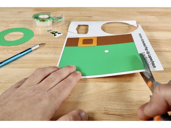 Cut out the two pieces of the tube hat that hides the gear rack.  You can also cut out your Leprechaun Topper and the hat brim; setting them aside for later use. The next steps pertain only to the Tube Template.