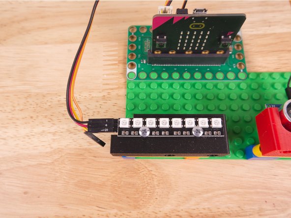 Alternately you can use some LEGO bricks and a rubber band or tape to hold the sensor in place. (But don't use anything conductive!)