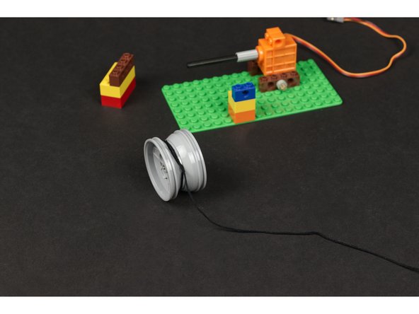 If everything looks right you can pull the wheel/rim off to add on some string.