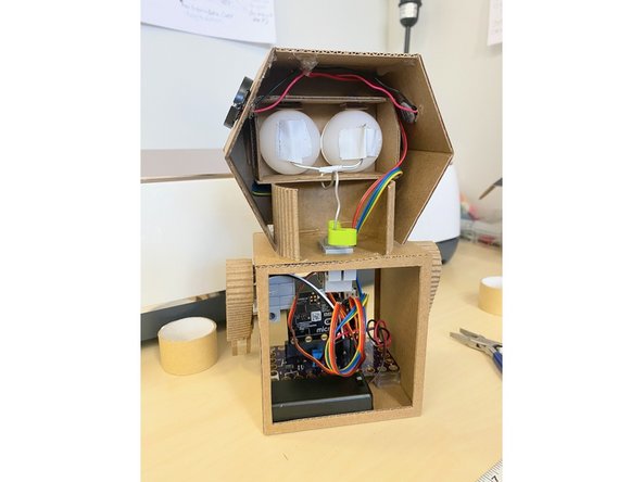 We placed the Bit Board into the robot's body and connected all the wires.